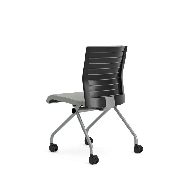 Chaise pliante Please - assise et dossier tissu - piétement sur roulettes
