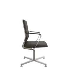 Fauteuil pivotant retour point fixe Directa - cuir - dossier bois - piétement aluminium poli sur patins
