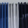 Rideau tamisant Elli - 150 x 230 cm - 100 % polyester M1 - tête à oeillet - ourlet bas - la paire