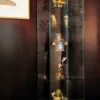 Vitrine d'exposition Alrami - verre trempé - portes coulissantes - 4 étagères - l. 52 x h. 180 cm